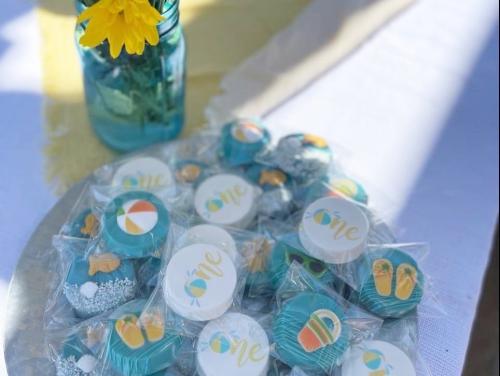 Chocolate covered oreo party favors with custom create your own first birthday beach theme cupcake toppers