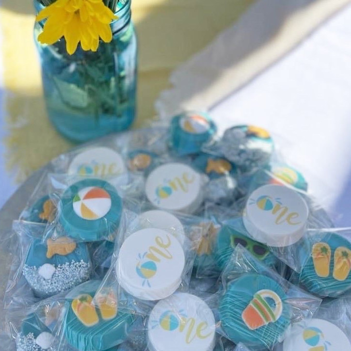 Chocolate covered oreo party favors with custom create your own first birthday beach theme cupcake toppers